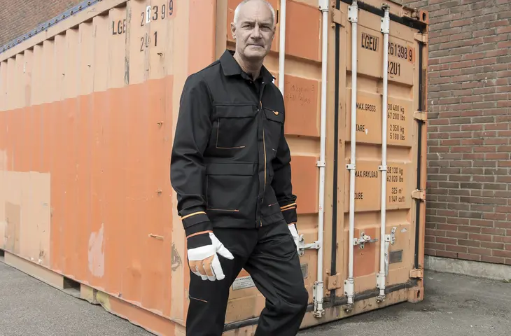 A man wearing an Everywear jacket